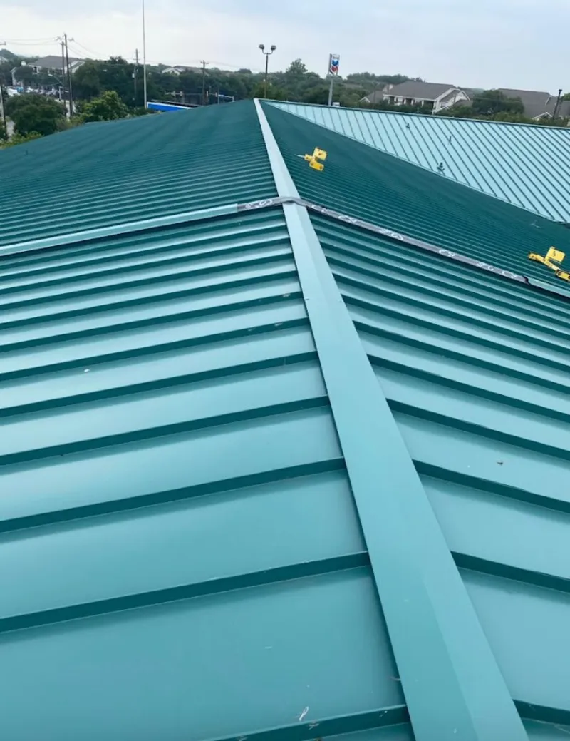Green commercial metal roof ridge and valley for Metal Roof Repair in Webster